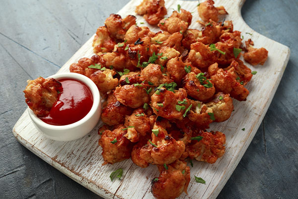 Healthy Buffalo Cauliflower Bites image